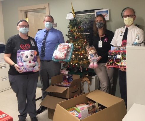 Delaware Valley Hospital collected toys for children in need. Brittany Bates, left, Randy Taylor, Melissa Griffin, Seth Wildenstein.
